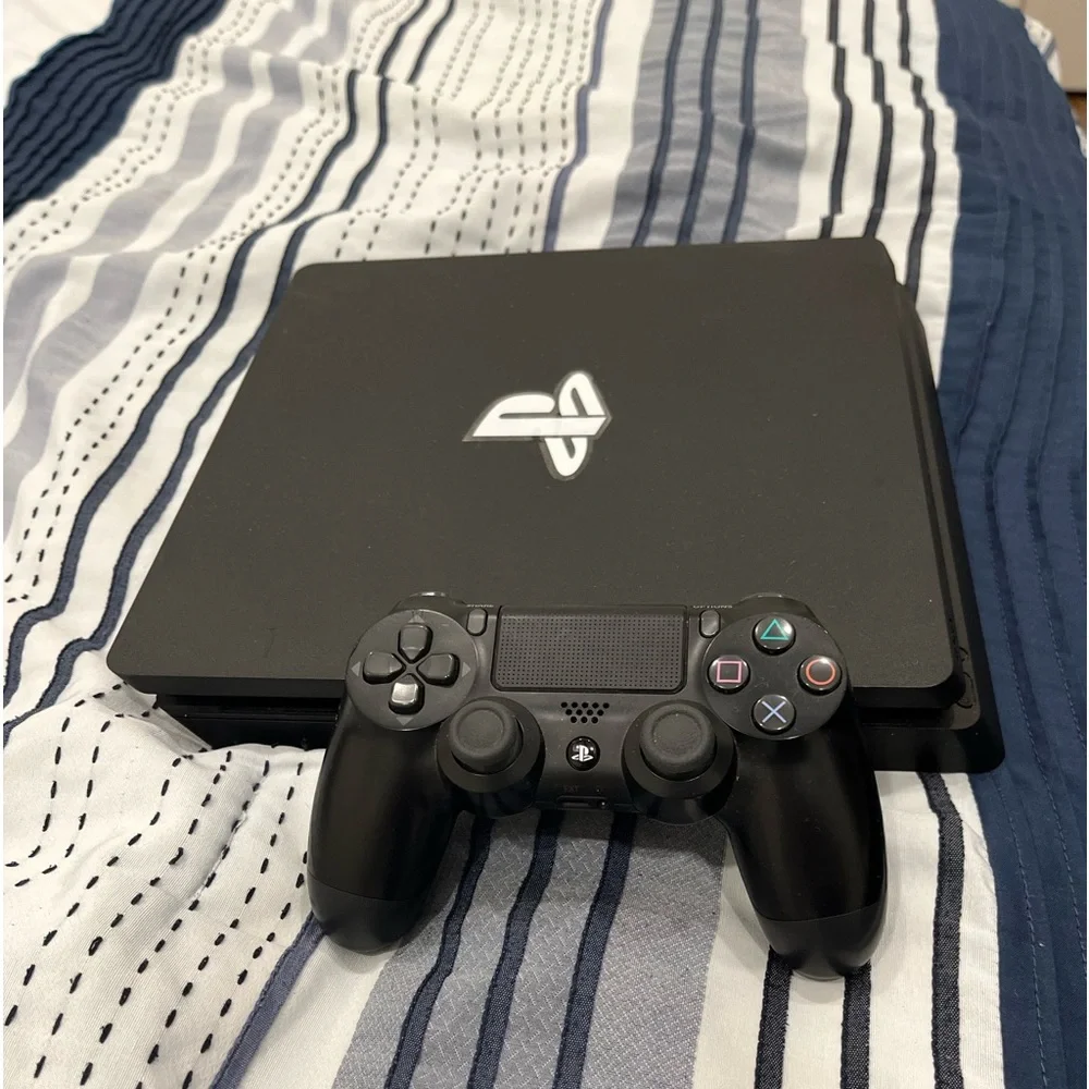 PS4 system with controller and 1 game